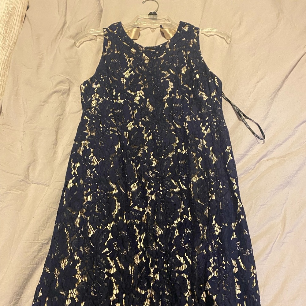 Knee high navy blue dress.